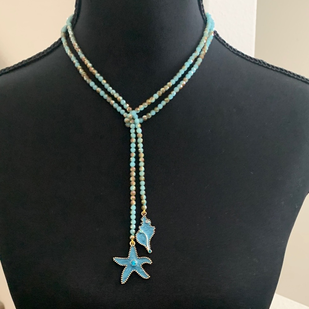 NWOT Lariat Style Aqua Beaded Necklace with Starfish Pendant.